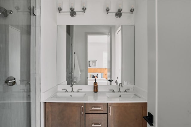 2209 Woodland Ave Unit 501, Austin, TX 78741 - ensuite bathroom with a stall shower and double vanity