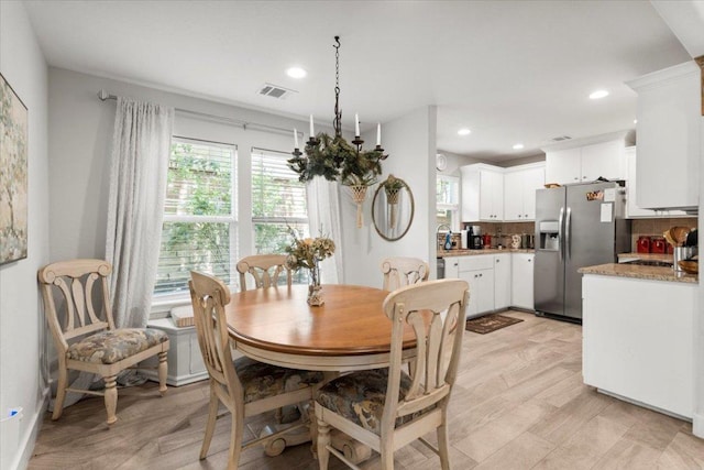 113 S Kanaio Dr, Bastrop, TX 78602 - dining room with plenty of natural light and recessed lighting