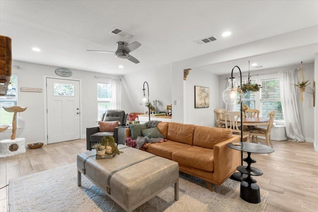 113 S Kanaio Dr, Bastrop, TX 78602 - living area featuring light wood-type flooring, a ceiling fan, and recessed lighting