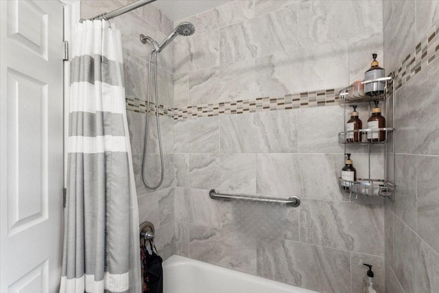 113 S Kanaio Dr, Bastrop, TX 78602 - bathroom featuring shower / tub combo with curtain