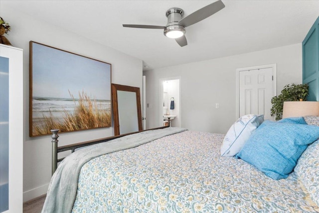 113 S Kanaio Dr, Bastrop, TX 78602 - bedroom with baseboards, a ceiling fan, and wood finished floors