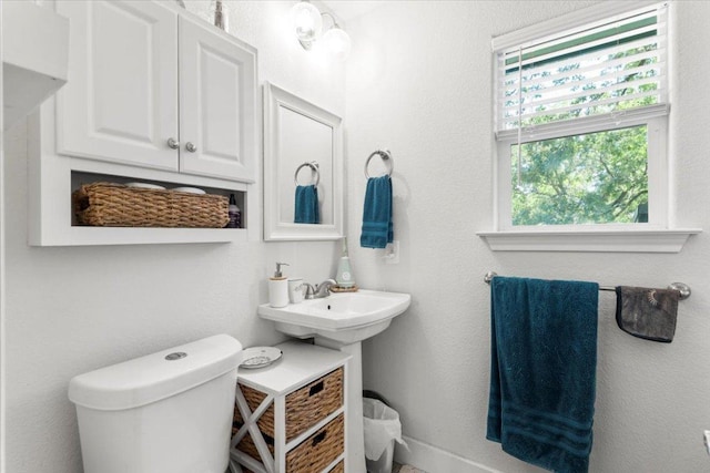 113 S Kanaio Dr, Bastrop, TX 78602 - half bathroom with toilet