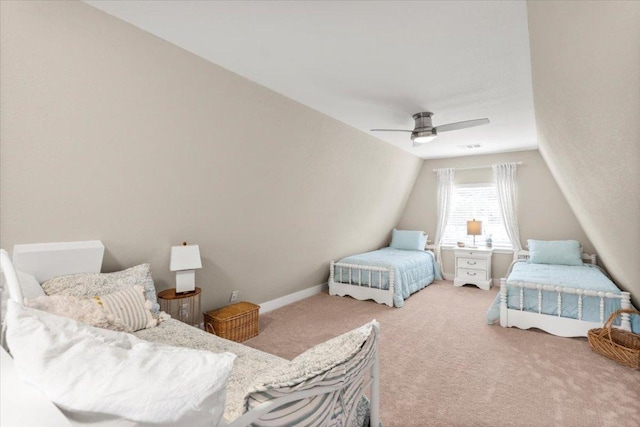 113 S Kanaio Dr, Bastrop, TX 78602 - carpeted bedroom with lofted ceiling, a ceiling fan, and baseboards