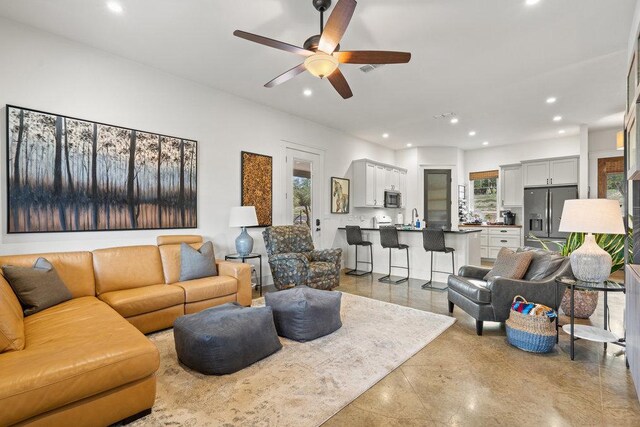 9750-9800 Ledgestone Ter, Austin, TX 78737 - living area with recessed lighting and ceiling fan