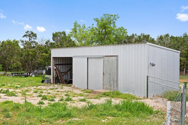 9750-9800 Ledgestone Ter, Austin, TX 78737 - view of pole building featuring fence