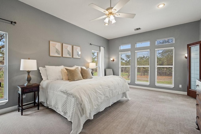 9750-9800 Ledgestone Ter, Austin, TX 78737 - bedroom with light carpet, baseboards, recessed lighting, and ceiling fan