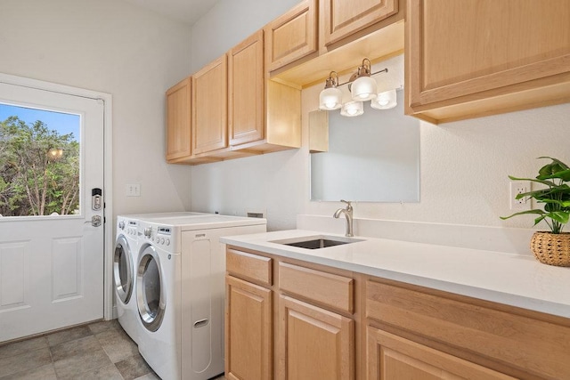 9750-9800 Ledgestone Ter, Austin, TX 78737 - washroom featuring separate washer and dryer and cabinet space