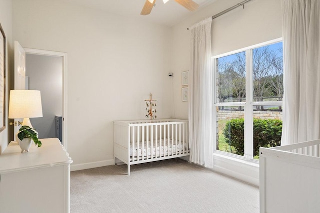 9750-9800 Ledgestone Ter, Austin, TX 78737 - bedroom with light colored carpet, multiple windows, baseboards, and a crib