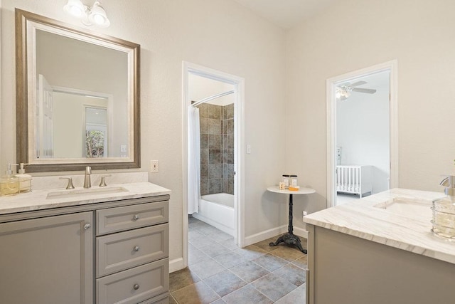 9750-9800 Ledgestone Ter, Austin, TX 78737 - bathroom with vanity, shower / tub combo with curtain, baseboards, and tile patterned flooring