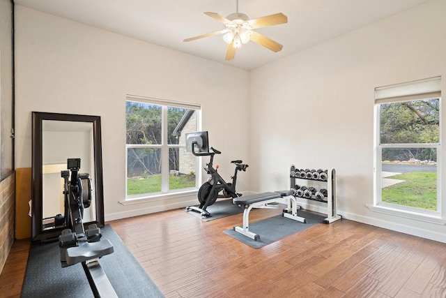 9750-9800 Ledgestone Ter, Austin, TX 78737 - exercise room featuring wood finished floors, a ceiling fan, and baseboards