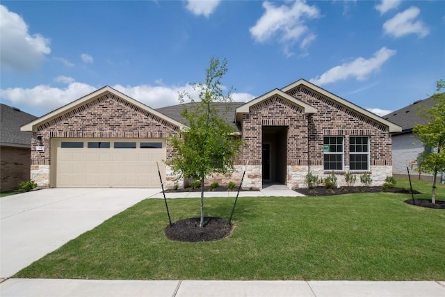 513 Tekoa Dr, Georgetown, TX 78628 - view of front of property featuring brick siding, concrete driveway, a front lawn, a garage, and stone siding
