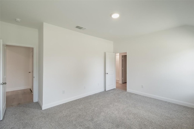513 Tekoa Dr, Georgetown, TX 78628 - empty room with light carpet, baseboards, a smoke detector, and recessed lighting