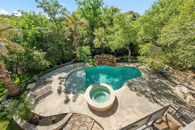 3205 Rustic River Cv, Austin, TX 78746 - view of swimming pool with a patio area and a pool with connected hot tub