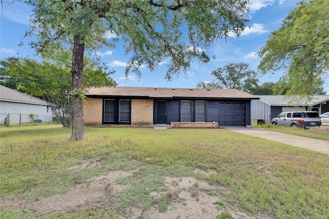 4504 Little Hill Cir, Austin, TX 78725 - single story home with a garage, driveway, and brick siding