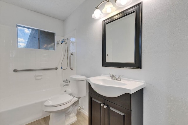 4504 Little Hill Cir, Austin, TX 78725 - full bath featuring wood finished floors, toilet, vanity, and shower / bath combination
