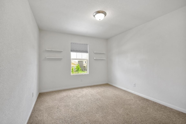 750 Bunton Reserve Blvd, Kyle, TX 78640 - empty room with carpet and baseboards