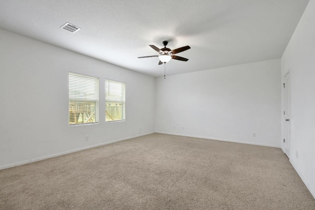 750 Bunton Reserve Blvd, Kyle, TX 78640 - unfurnished room with ceiling fan and light colored carpet
