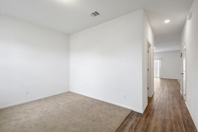 750 Bunton Reserve Blvd, Kyle, TX 78640 - spare room featuring recessed lighting and wood finished floors