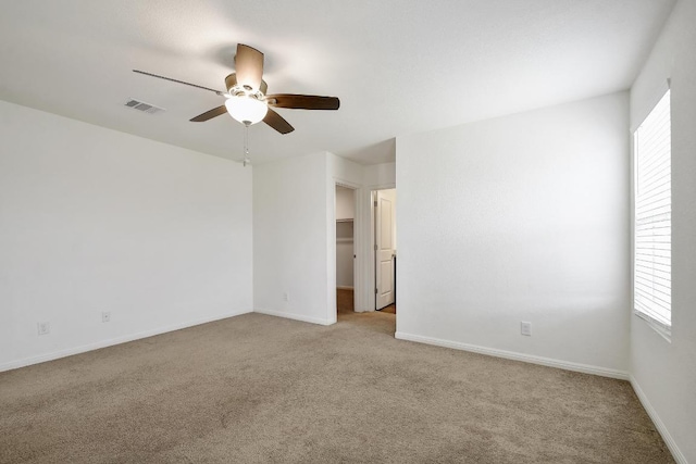 750 Bunton Reserve Blvd, Kyle, TX 78640 - carpeted empty room featuring a ceiling fan and baseboards