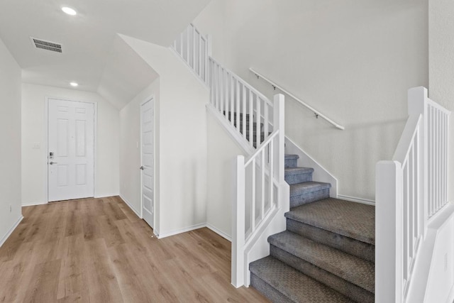 3759 Liberi Ln, Round Rock, TX 78665 - staircase with wood finished floors, recessed lighting, baseboards, and vaulted ceiling