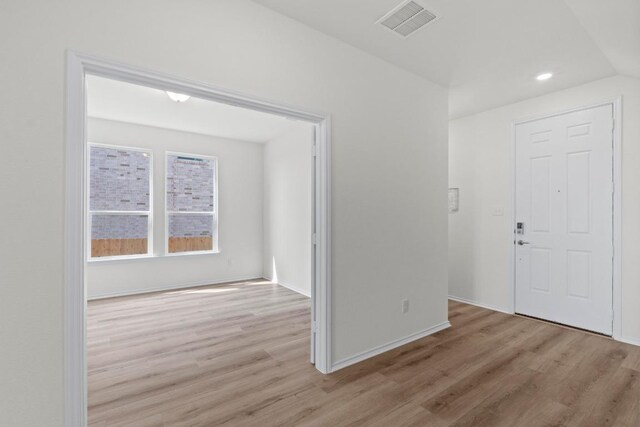 3759 Liberi Ln, Round Rock, TX 78665 - spare room featuring wood finished floors, recessed lighting, and baseboards