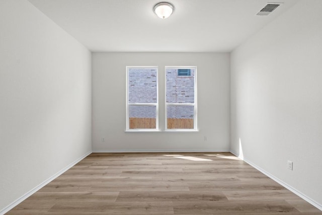 3759 Liberi Ln, Round Rock, TX 78665 - unfurnished room with wood finished floors and baseboards