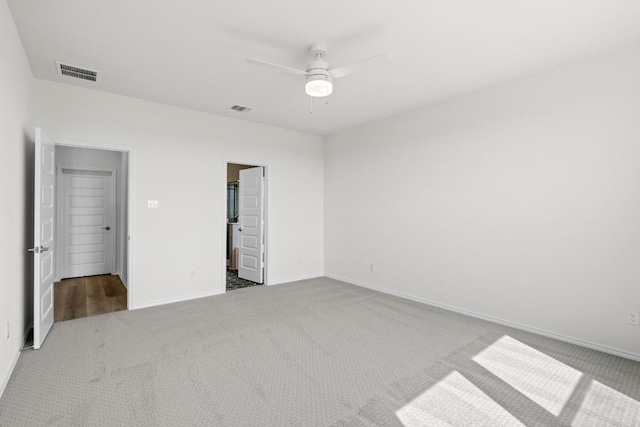 3759 Liberi Ln, Round Rock, TX 78665 - unfurnished bedroom featuring carpet flooring, baseboards, a ceiling fan, and ensuite bathroom