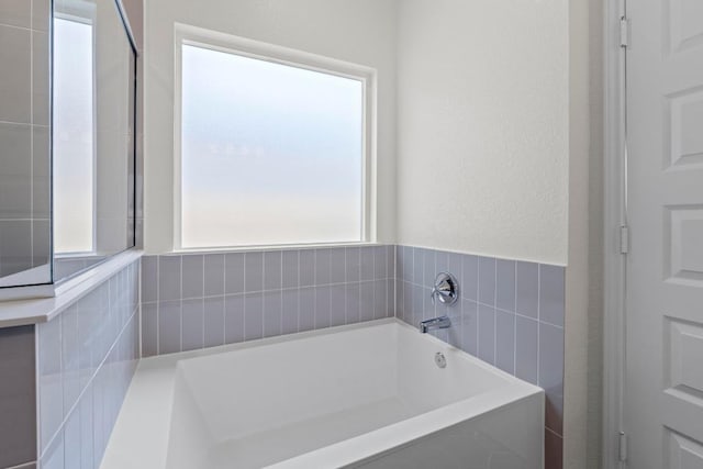 3759 Liberi Ln, Round Rock, TX 78665 - bathroom with a garden tub