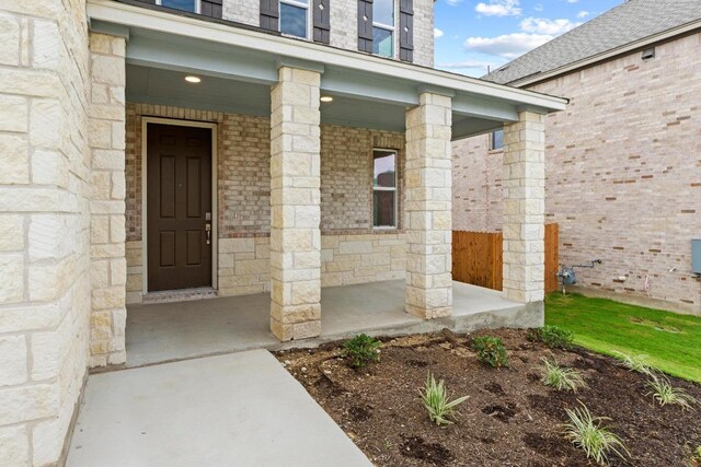 3759 Liberi Ln, Round Rock, TX 78665 - doorway to property with a porch and stone siding