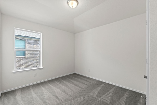 3759 Liberi Ln, Round Rock, TX 78665 - carpeted empty room featuring baseboards and lofted ceiling