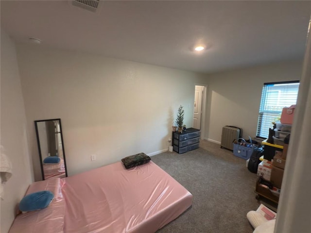 721 Yearwood Ln Unit 45E, Jarrell, TX 76537 - bedroom featuring carpet flooring and baseboards