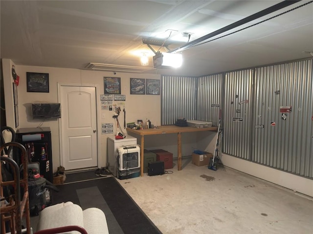 721 Yearwood Ln Unit 45E, Jarrell, TX 76537 - garage featuring a garage door opener