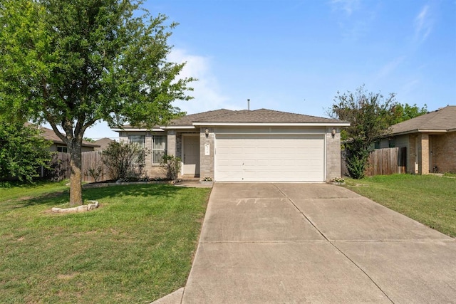 404 Paige Bnd, Hutto, TX 78634 - single story home featuring brick siding, an attached garage, and driveway