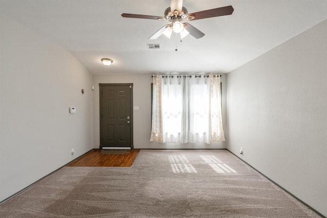 404 Paige Bnd, Hutto, TX 78634 - carpeted foyer with a ceiling fan