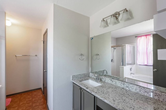 404 Paige Bnd, Hutto, TX 78634 - full bathroom with a shower stall, a bath, and vanity