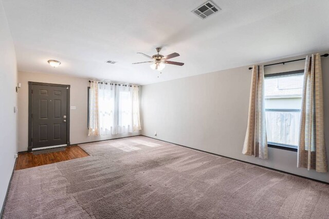 404 Paige Bnd, Hutto, TX 78634 - empty room with ceiling fan and carpet floors