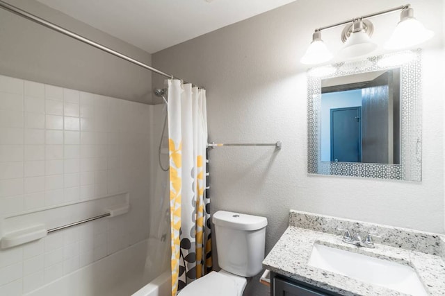 404 Paige Bnd, Hutto, TX 78634 - bathroom featuring vanity, shower / tub combo, and a textured wall