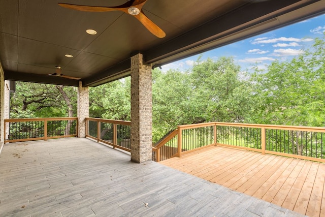 wooden terrace featuring ceiling fan