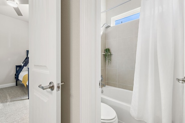19312 Abigail Way, Pflugerville, TX 78660 - full bathroom featuring shower / tub combo with curtain, toilet, ceiling fan, and baseboards