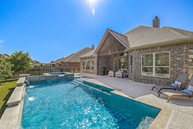 19312 Abigail Way, Pflugerville, TX 78660 - view of pool featuring a patio area, a fenced backyard, and a pool with connected hot tub