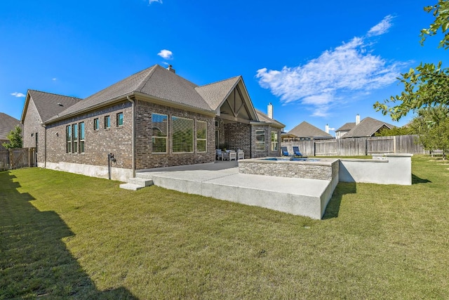 19312 Abigail Way, Pflugerville, TX 78660 - rear view of house featuring brick siding, a patio, and a chimney