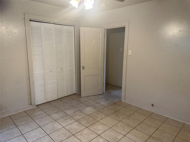 1711 Singleton Ave, Austin, TX 78702 - unfurnished bedroom with a closet and light tile patterned flooring