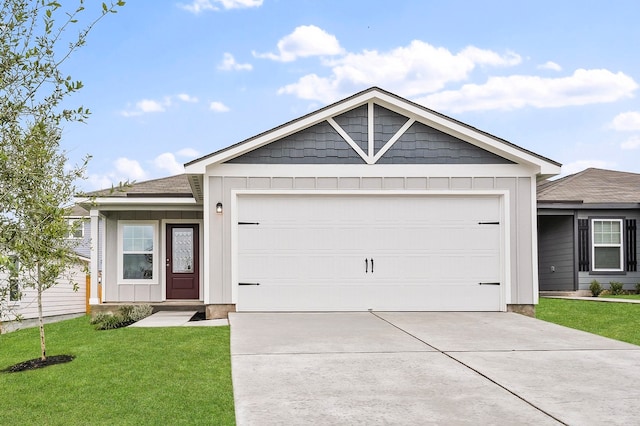 208 Morrison Dr, Jarrell, TX 76537 - ranch-style house with driveway, an attached garage, board and batten siding, and a front yard