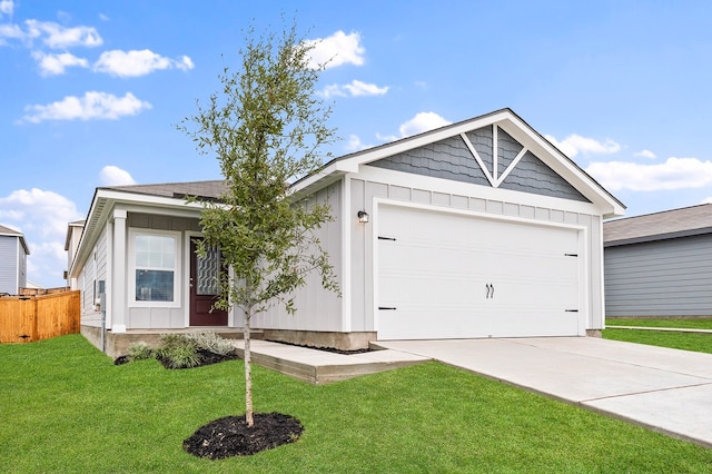 120 Morrison Dr, Jarrell, TX 76537 - ranch-style home featuring board and batten siding, driveway, and a garage