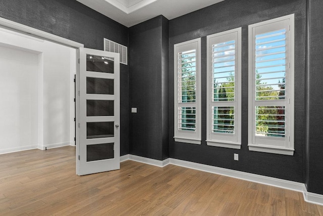 406 Woodside Ter, Austin, TX 78738 - unfurnished room with wood finished floors
