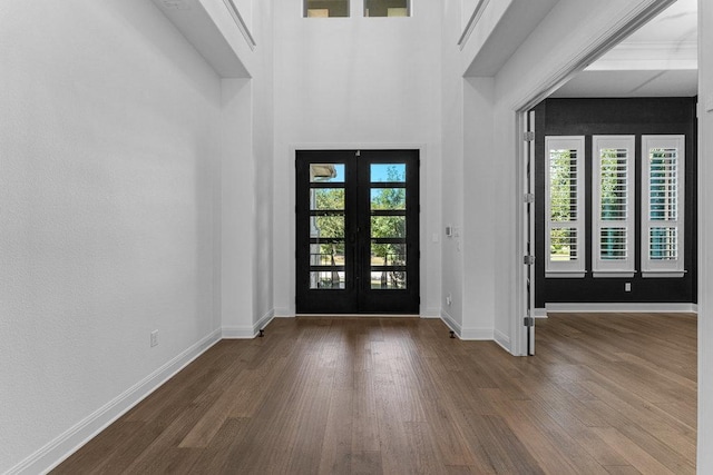 406 Woodside Ter, Austin, TX 78738 - foyer featuring french doors, wood finished floors, and plenty of natural light