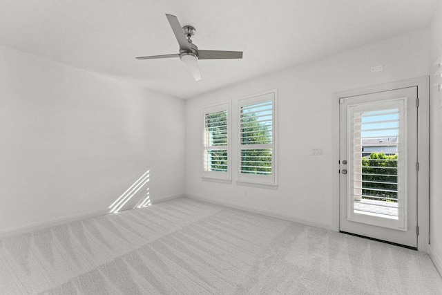 406 Woodside Ter, Austin, TX 78738 - empty room featuring light colored carpet, a ceiling fan, and baseboards