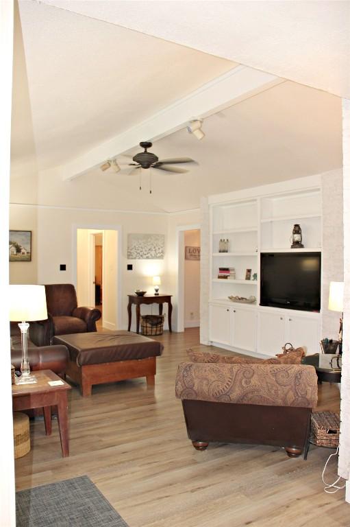 3616 Arrowhead Cir, Round Rock, TX 78681 - living area with ceiling fan, beamed ceiling, and light wood-type flooring