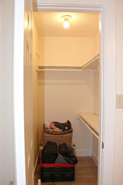 3616 Arrowhead Cir, Round Rock, TX 78681 - spacious closet featuring wood finished floors