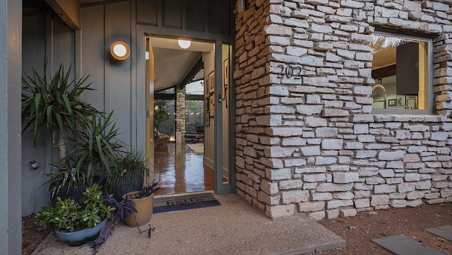 202 Tanglewood Dr, Fredericksburg, TX 78624 - entrance to property featuring board and batten siding and brick siding